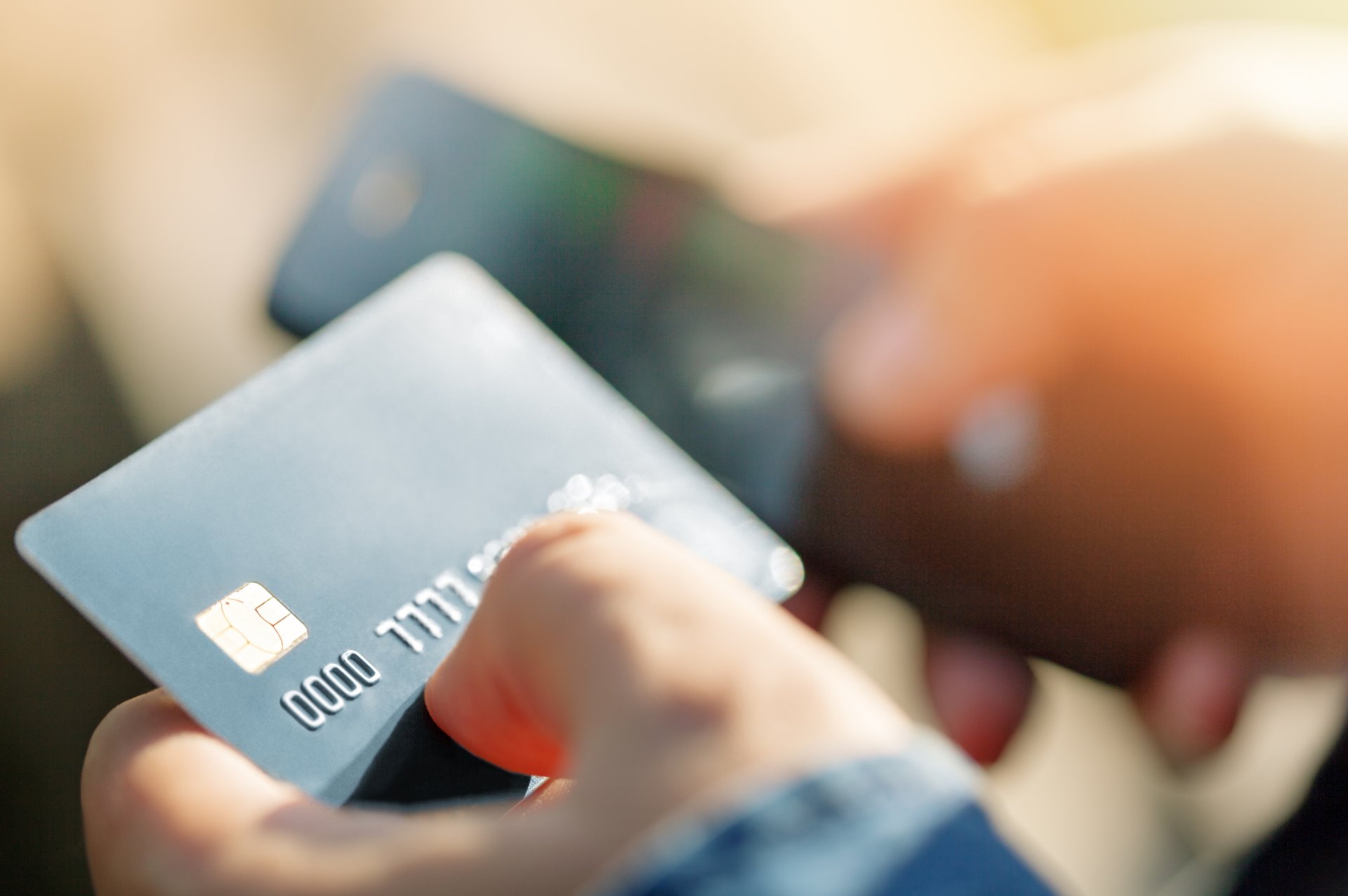 man holding credit card